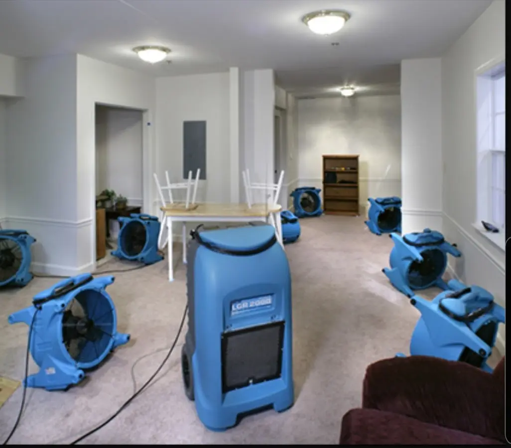 Air movers and dehumidifier setup for Water Damage Restoration in Pewaukee
